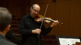 Dr. Leonid Yanovskiy, director of the UWF String Program, conducts the “Runge Strings” Orchestra as they rehearse for their upcoming performance at the University of West Florida.