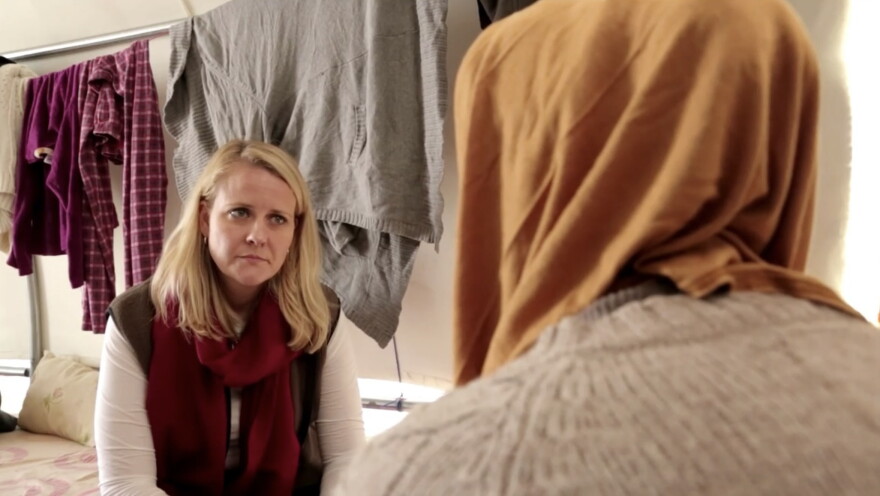 Correspondent Marcia Biggs speaks with a Yazidi teenager in northern Iraq in 2015 who escaped trafficking by ISIS militants.