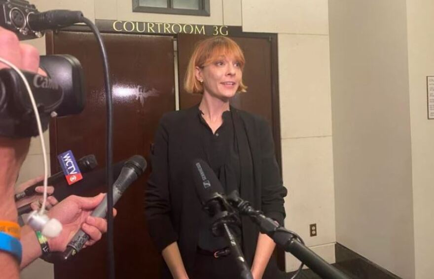  Lauren Brenzel, organizing director of the Florida Alliance of Planned Parenthood Affiliates, speaks to reporters after a Leon County circuit judge ruled that a 15-week abortion limit is unconstitutional.
