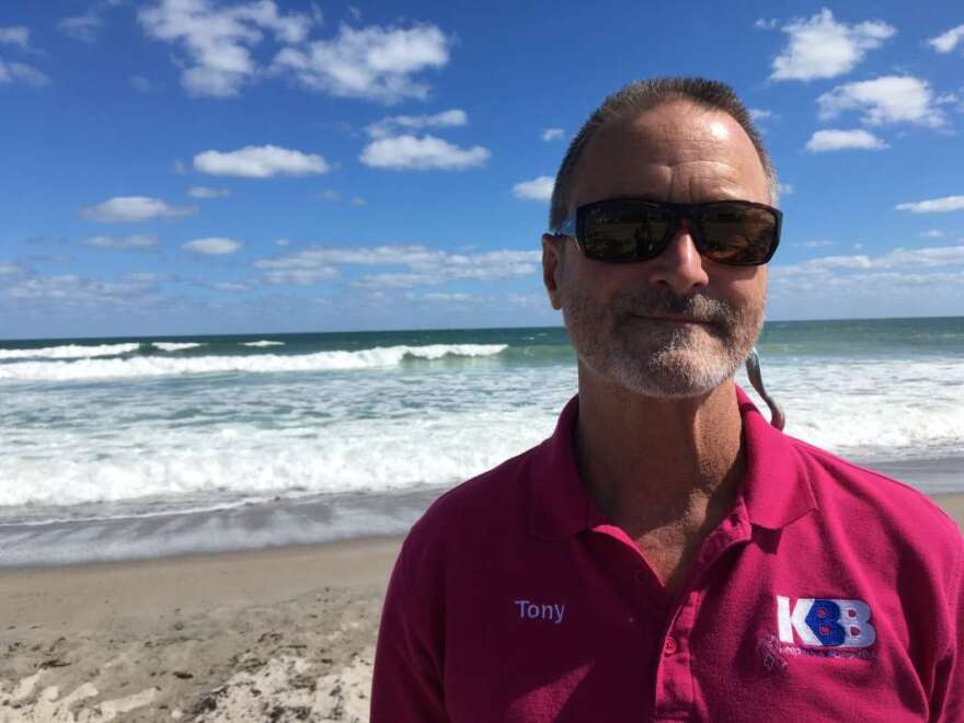 Tony Sasso of Keep Brevard Beautiful estimates volunteers have cleaned up as much as 10 tons of dead fish from county beaches. 