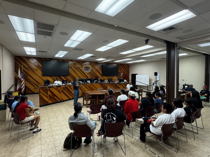 Ivan Bender speaking to the Quechan Tribal Chamber, families and tribal members.