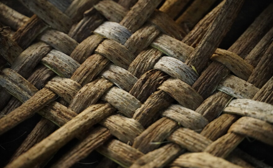 Twill woven kudzu vines that have been split and scraped flat.