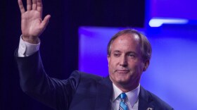 Attorney General Ken Paxton waves to the crowd during the Texas Republican Party's convention in San Antonio in 2018.