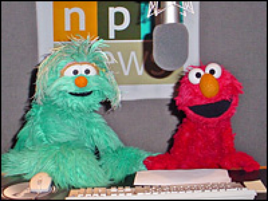 Rosita, left, and Elmo in the NPR studios.