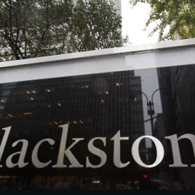 FILE - A sign for The Blackstone Group L.P. investment firm stands in front of their offices, Oct. 15, 2018, in New York. Blackstone Group is a private equity firm.