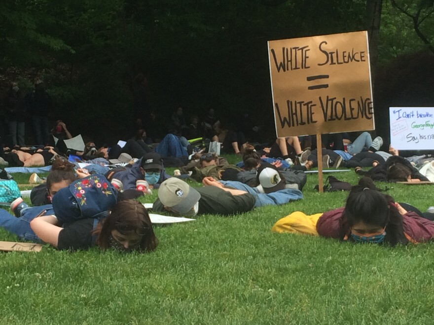 Lying face-down with their hands behind their backs, as though handcuffed like George Floyd was when he was killed by police in Minneapolis last week, protesters in Ashland Sunday chanted Floyd's last words, "I can't breathe."