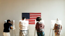 Exercising the right to vote.