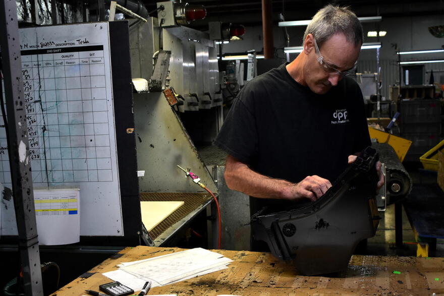 A worker at an Indiana plastic company.
