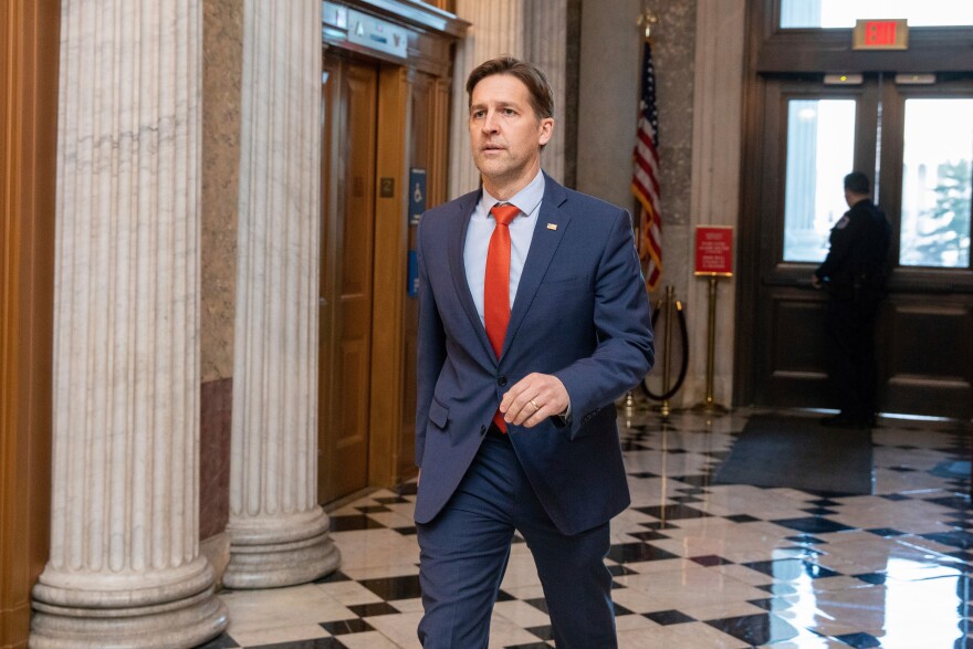 FILE - Sen. Ben Sasse, R-Neb., walks the halls of the Capitol in Washington, Wednesday, Jan. 19, 2022. (AP Photo/Amanda Andrade-Rhoades, File)