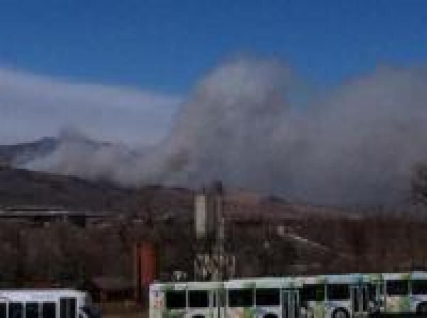 Smoke from the Lefthand Canyon fire can be seen from a rooftop near 55th and Arapahoe avenues.