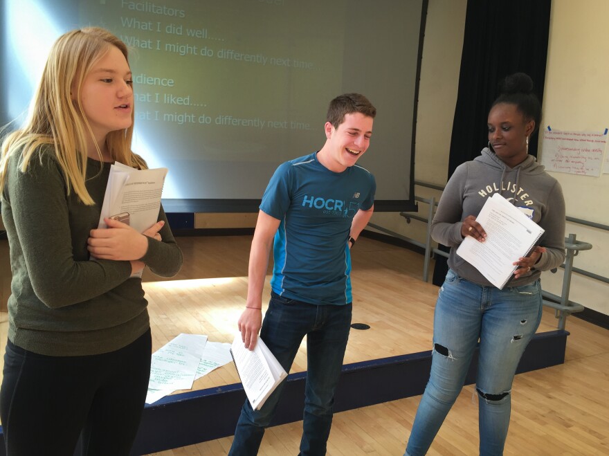 After participating in tolerance workshops for two days, Maddie Kennedy (left), Josh Gladstone and Raven Bogues practice being presenters before they run the same workshops for their peers.