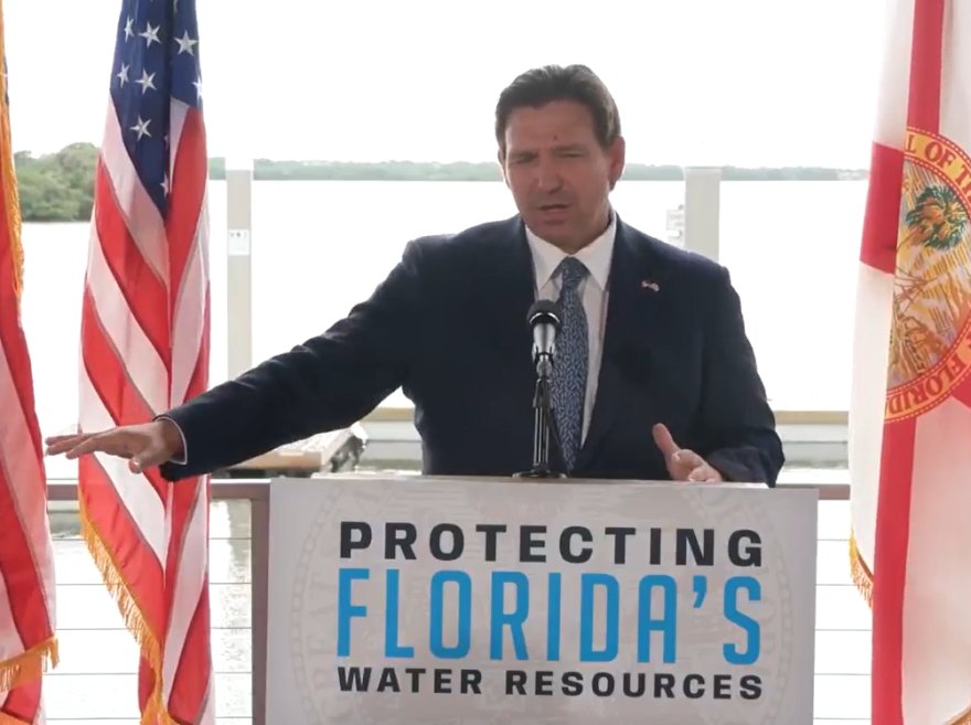 Man speaking at podium