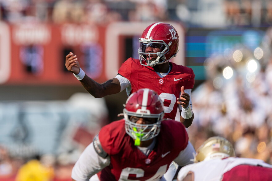 Alabama quarterback Keelon Russell (12) sets up a play against Florida State during the first half of an NCAA college football game Saturday, Sept. 19, 2026, in Tuscaloosa, Ala. (AP Photo/Vasha Hunt)