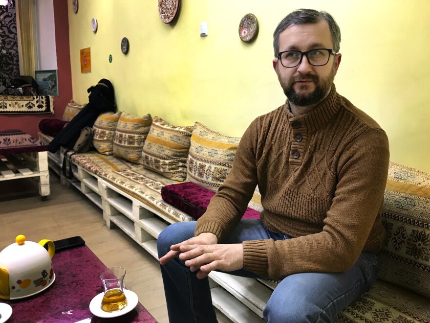 Nariman Dzhelyal, a Crimean Tatar leader, in a cafe in Crimea's capital Simferopol last month. He has remained in Crimea despite pressure from the Russian authorities.