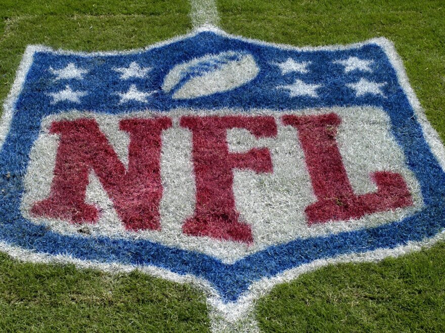 An NFL logo as the Tampa Bay Buccaneers host the Carolina Panthers at Raymond James Stadium on Oct. 12, 2008 in Tampa, Florida. The NFL has suspended all aspects of its COVID-19 protocols, citing recent trends showing that the spread of the coronavirus is declining.