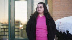 Jena Gross stands for a photo outside her apartment building in Parma.