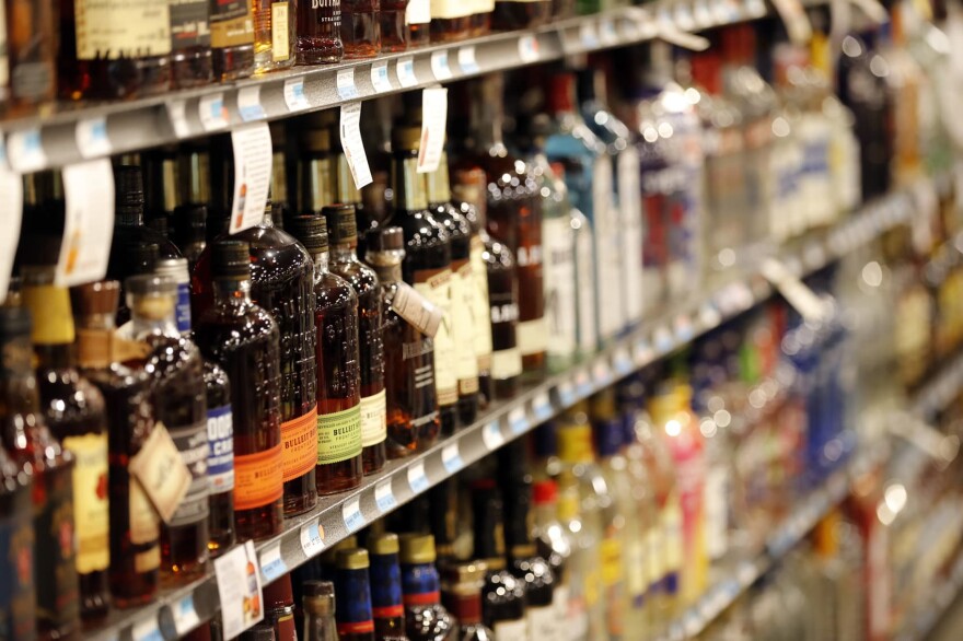 Liquor bottles are seen on display at a grocery store in River RIdge, La., Wednesday, July 11, 2018. (AP Photo/Gerald Herbert)