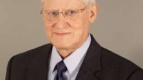 G. Rollie Adams