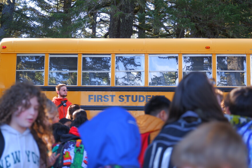 Students get off the bus