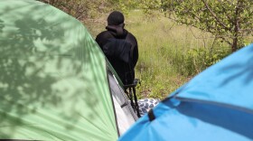 Two tents in northeast Rochester, shown here on May 21, 2026, are home to Arelen and Rasahad, a couple living in one of the 28 homeless encampments counted by the city this spring.