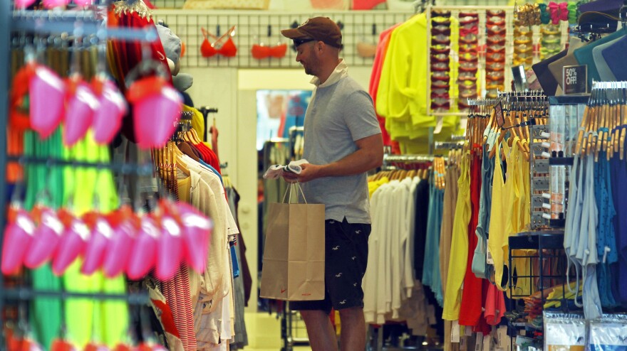 A man views merchandise at an American Apparel store on the Third Street Promenade in Santa Monica, Calif., on April 24, 2012. Each year, the company makes more than 40 million articles of clothing out of its L.A.-area factory.