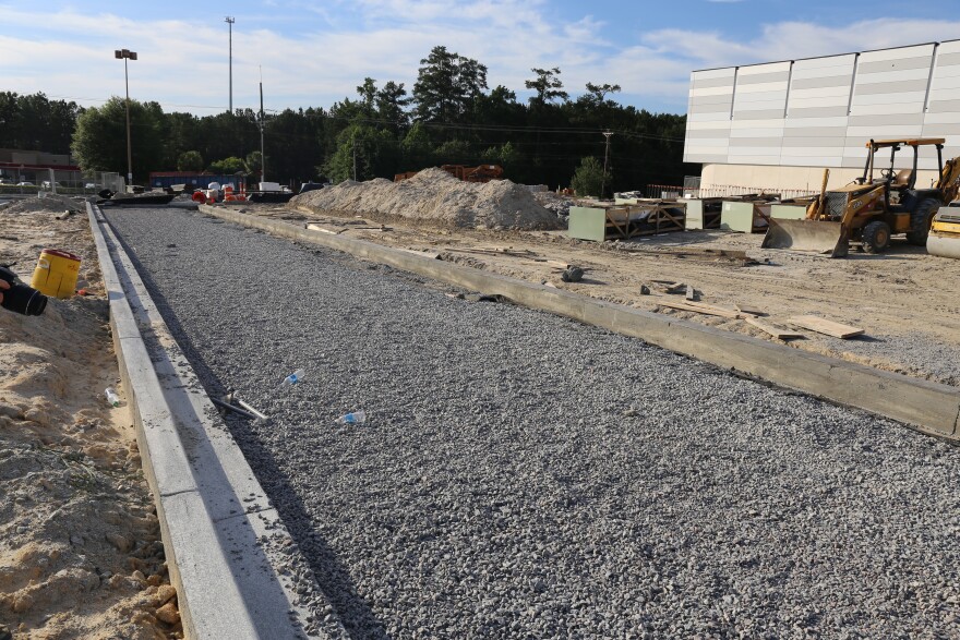 Aggregate for what will become pervious concrete surfaces at the new Richland Count Magistrate. Unlike standard concrete, pervious concrete is porous and lets water infiltrate back into the ground rather than pass over top. 