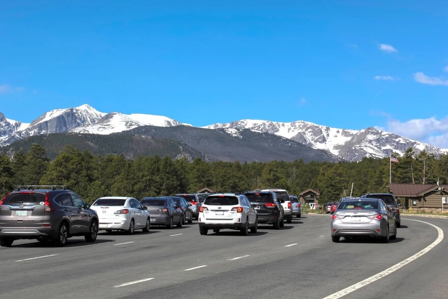 Cars line up at the Beaver Meadows entrance to Rocky Mountain National Park
