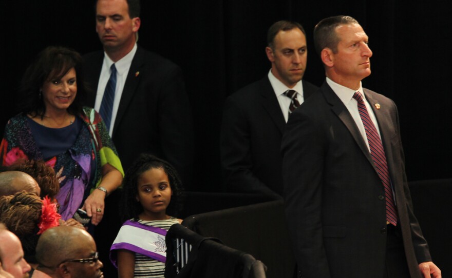 Eight-year-old Amariyanna Copeny, aka "Little Miss Flint," listens as President Obama gives his speech in Flint.