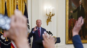 President Joe Biden gestures for a question from a reporter as he speaks about the coronavirus pandemic in the East Room of the White House in Washington, Tuesday, Aug. 3, 2021.