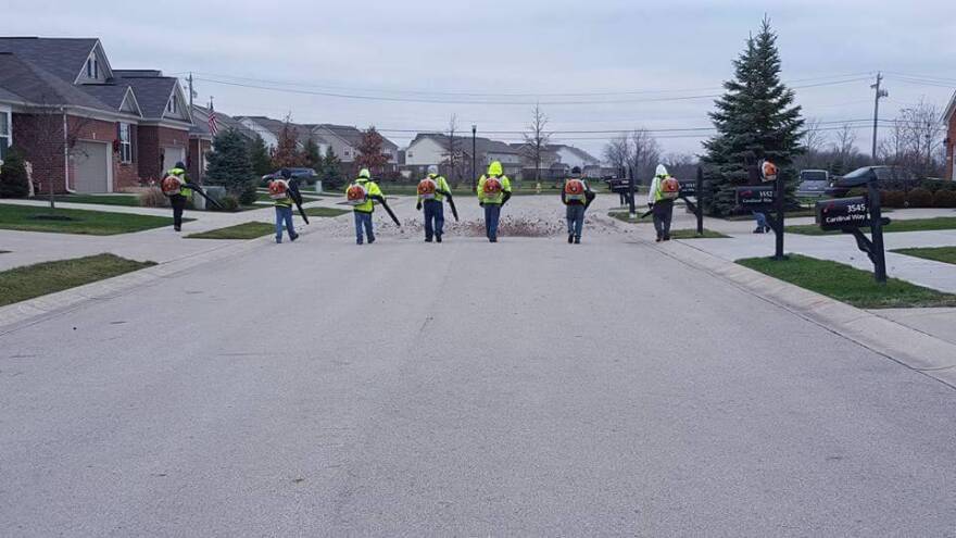 Indianapolis-area companies like Ski Landscaping, whose workers are seen on the job here, make up the bulk of Indiana's relatively small number of H-2B visa users.