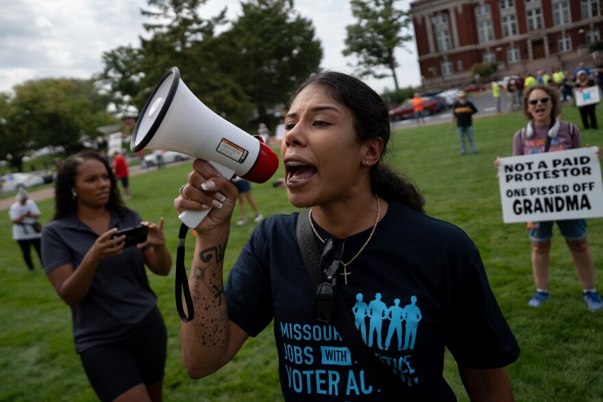 Milea Carbello, 28, of Springfield, Mo., leads hundreds in chanting during a demonstration decrying the legislature’s efforts to redraw Missouri’s congressional maps to favor the GOP on Wednesday, Sept. 10, 2025, at the state Capitol in Jefferson City.