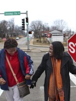 Tiffany Anderson (right), superintendent of the Jennings School District in north St. Louis County, Mo., performs crosswalk duty every morning to save the district money.