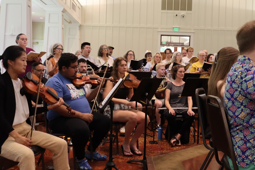 The Athens Choral Festival rehearses ahead of their concert to be held on Saturday, May 30th at 8 pm.