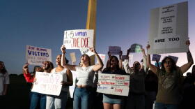 Demonstrators rally during a "Stop Sexual Violence" protest at the Washington Monument, Thursday, Oct. 8, 2026, in Washington. (Jose Luis Magana/AP)