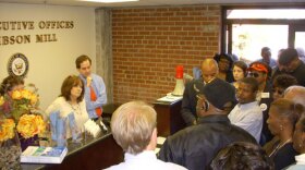 Kissell staffer Georgia Lozier (center) listening to members of the State Employees Association of NC and Workers United air