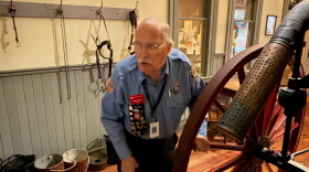 Retired Grand Rapids firefighter Dave Tiesma talks to visitors at the Grand Rapids Public Museum.
