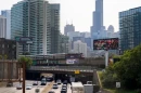 A Metra commuter train operated by Illinois' Regional Transportation Authority travels to downtown Chicago over Kennedy Expressway on interstate 90 and 94 in 2022. RTA will be replaced by a new board on Sept. 1.