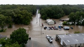 Flooding along E. St. Louis St. in Nashville, Ill., along the path where the dam spilled over, on July 16, 2024.