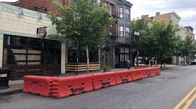 Barriers go up to allow outdoor dining along Vine Street in Over-the-Rhine.