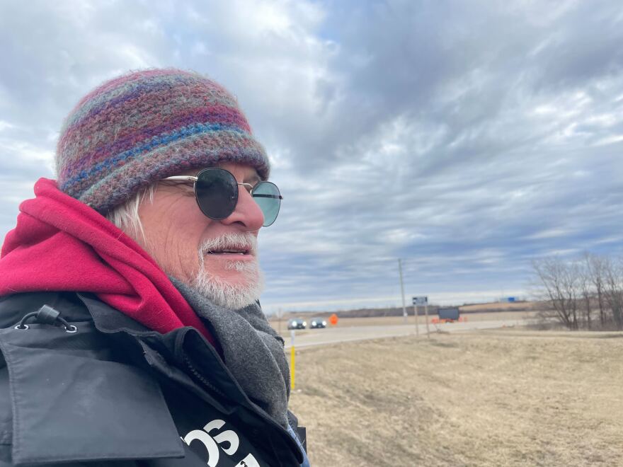 After remaining vigilant of the prairie through the night David Stocker leaves the former site of the Bell Bowl Prairie