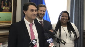 Gov. Ned Lamont's new chief of staff, Matt Brokman, addresses the media Tuesday in the governor's office. Outgoing Chief of Staff Jonathan Dach and Natalie Braswell, Lamont's general counsel, are in background.