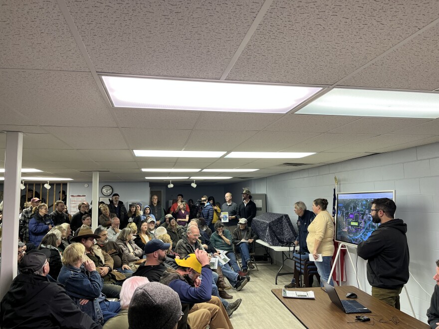Matt Rine takes questions about his idea for a data center in Kalkaska from a crowd gathered at Garfield Township Town Hall and Library in Fife Lake. (Photo: Claire Keenan-Kurgan/IPR)
