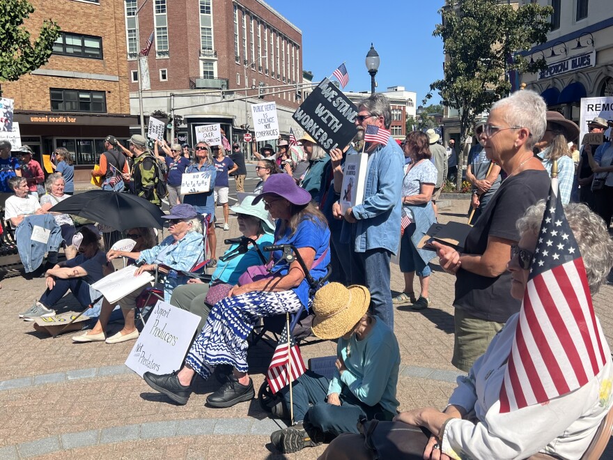 Bangor residents gather in West Market Square in downtown Bangor for a "Workers over Billionaires" rally on Labor Day, 2025.