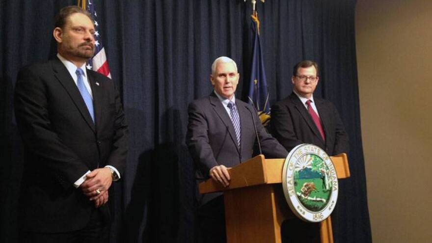 From left: Kent Abernathy, current chief of staff for IDEM and the to-be new BMV commissioner, Gov. Pence, and Don Snemis, the current BMV commissioner.