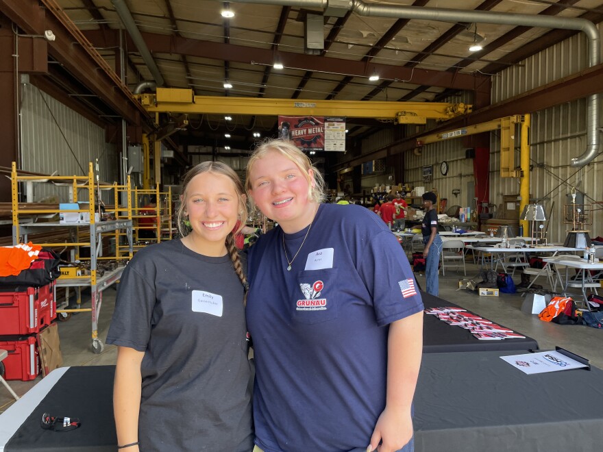 Emily Grassenhuber (left) and Ava Ayres pose for a photo together at Gunrau Company in Oak Creek. They're two of 20 students from across southeastern Wisconsin participating in the weeklong trades-focused summer camp.