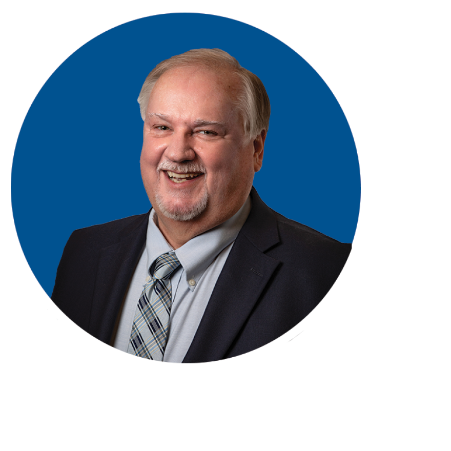 Mike Kint Headshot- edited with circle.png