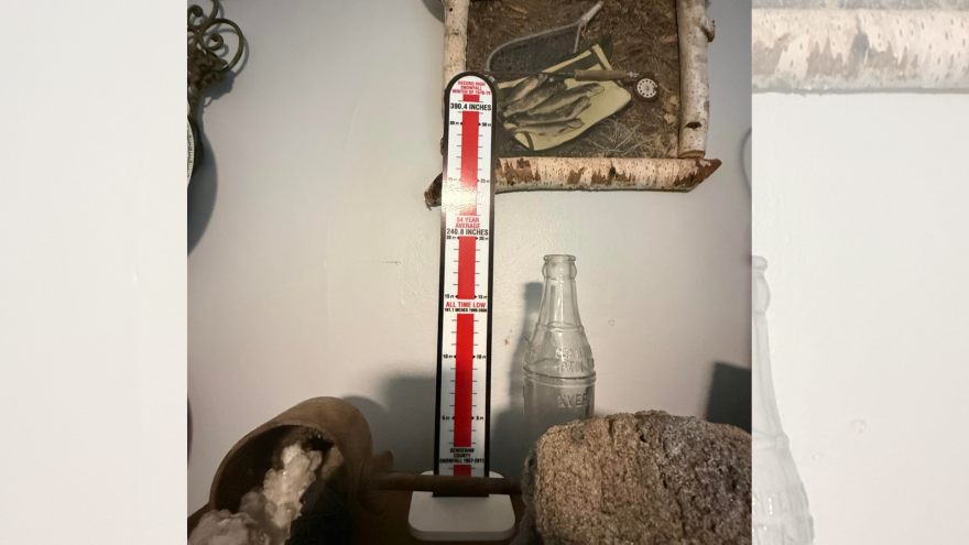 A thermometer measuring the inches of snow in the winter of 1978-79 in Houghton. The read part of the thermometer is near the top and it reads 390.4 inches. 