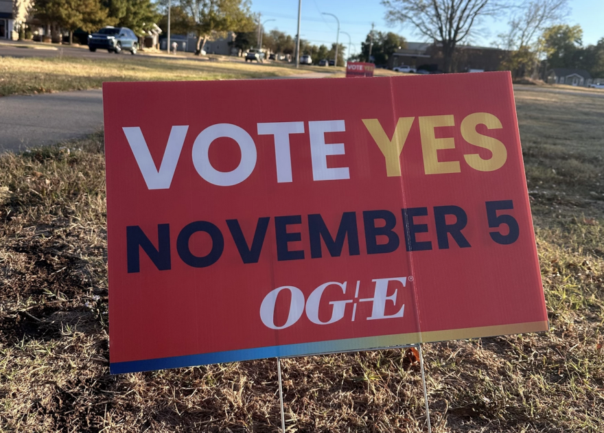 OG&E signs are displayed across Stillwater to encourage residents to vote 'yes' on a proposal that would make the utility company responsible for supplying power to the data center project.