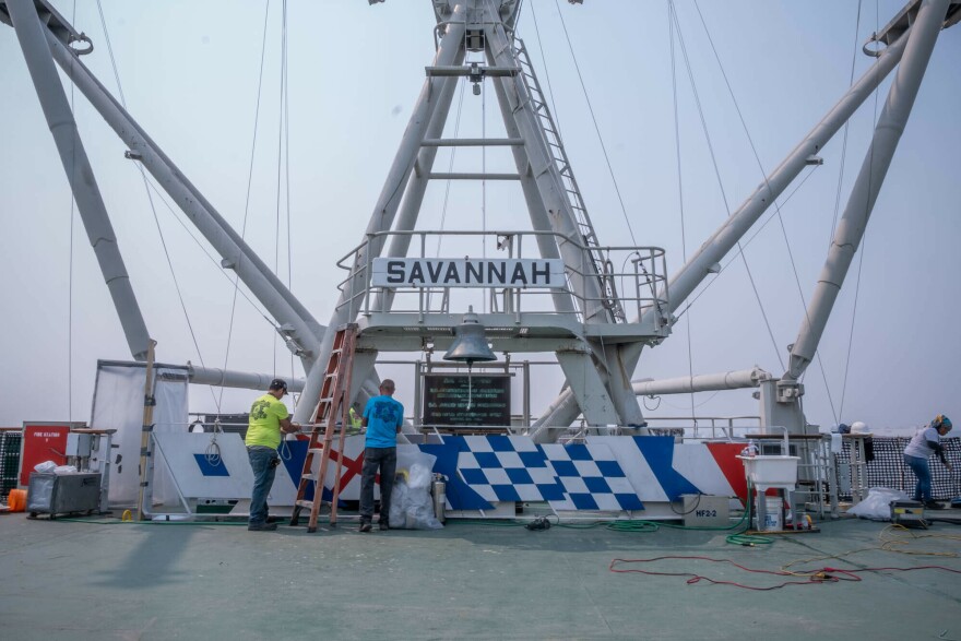 Crews continue work on the deck of the Savannah as decommissioning continues.The ultimate fate of the ship is uncertain.