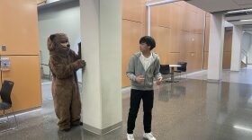Marcus Rivera (right) and Jonathan Lonzo record a TikTok video for a new, bear education program at Kodiak High School. (Photo: Kirsten Dobroth/KMXT)
